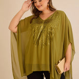 Празнична туника с акцент от пайети в свободна кройка -  пистачио