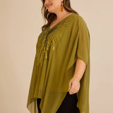 Празнична туника с акцент от пайети в свободна кройка -  пистачио